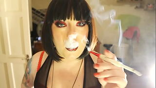 Big Domme Tina Smua A Filterless Cigarette Beside A Covering